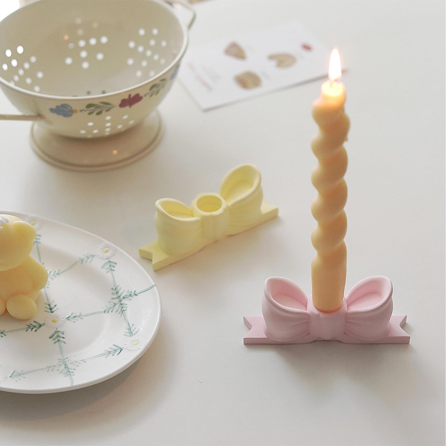 write a description of Bow candle holder Bow candlestick holder