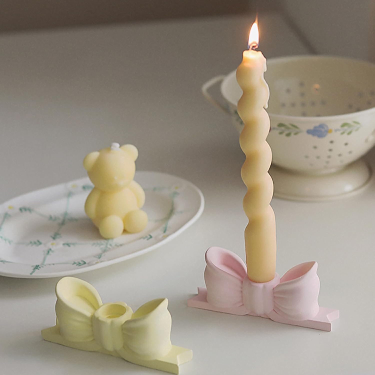 write a description of Bow candle holder Bow candlestick holder